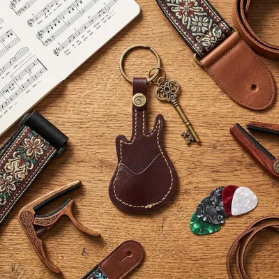 Soporte para púas de guitarra con bolsa de piel portátil, negro - Mejor Oferta